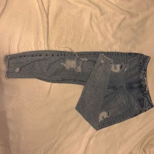 TinselTown Brand ripped jeans, high waisted, cropped at the bottom of pant leg.